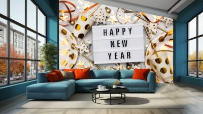 Happy new year lightbox celebration message with luxury gold party decorations Wall mural