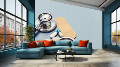 Healthcare background with stethoscope plasters and tablets Wall mural