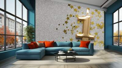 Number 1 gold celebration candle on star and glitter background Wall mural