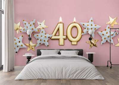 Number 40 gold candle and stars on a pastel pink background Wall mural