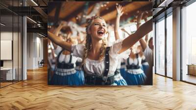 Oktoberfest waitress having fun and dancing at a beer festival event wearing a traditional costume Wall mural