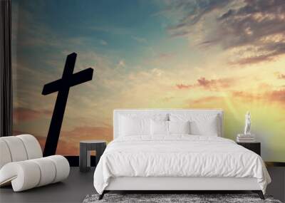 Religious cross silhouette against a bight sunrise sky. 3D Rendering Wall mural