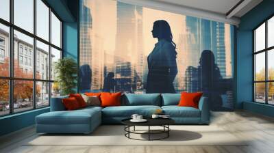 Silhouette of a female businesswoman double exposure against an urban city background Wall mural