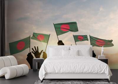 Silhouette of arms raised waving a Bangladesh flag with pride. 3D Rendering Wall mural