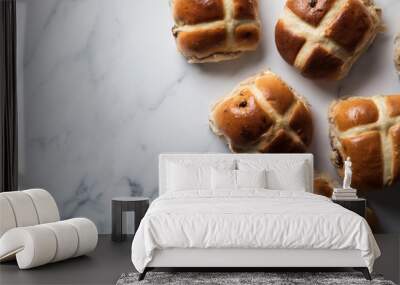 Traditional hot cross buns with raisins on a marble surface Wall mural