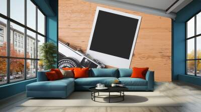 vintage retro camera with a blank instant photograph frame Wall mural