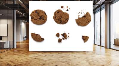 Chocolate chip cookies with some broken and crumbs on white background. Wall mural