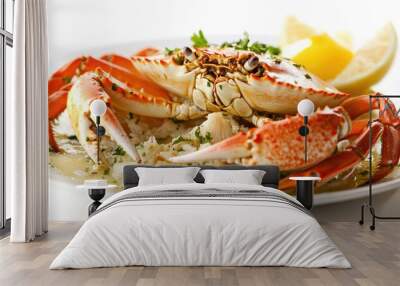 Close-up of a cooked crab with lemon wedges and parsley on a white plate. Wall mural