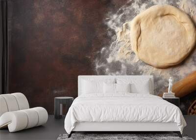 Rolling pin with flour on stone background Wall mural