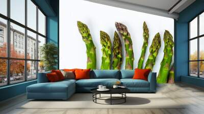 Bunch of fresh raw asparagus on white background, vegetarian concept. Green grass sparrowgrass sticks, food for veggie. Wall mural