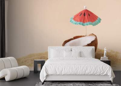  Creative composition with coconut and sun parasol. Tropical beach concept with half of coconut. Wall mural