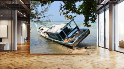 Old wooden boat on the beach Wall mural