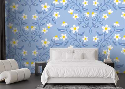 Seamless vector pattern with camomiles on blue background Wall mural