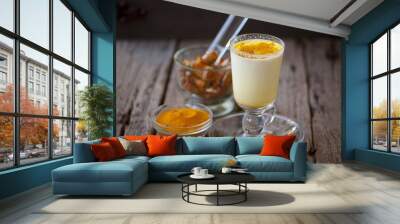 Turmeric with milk drinks good for beauty and health Wall mural