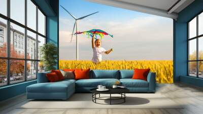 Little girl runs in a wheat field with a kite Wall mural