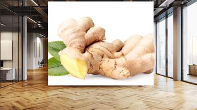 Ginger root with leaves close-up on a white background. Wall mural