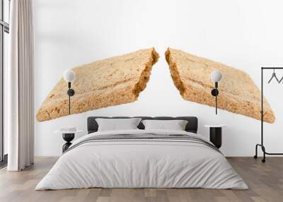 Two halves of the broken crispy bread on a white background, isolated. Wall mural