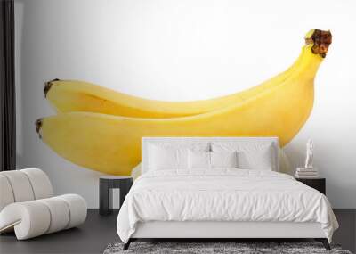 Two ripe bananas, and cut a piece of peeled banana on a white, isolated. Wall mural