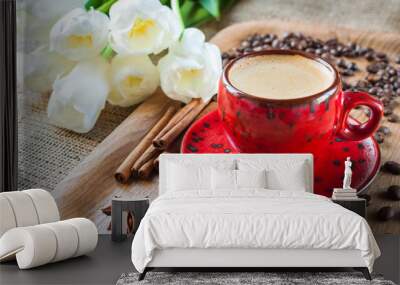 cup of coffee on wooden background decorated with spices and flowers Wall mural