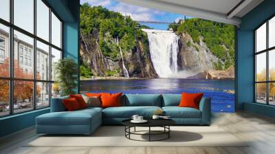 Magnificent view of the Montmorency Falls and the suspension bridge on a bright summer day with blue skies near Quebec city, the capital of Quebec province,Canada Wall mural