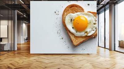 Toast with fried egg in heart shape, white background, space for text. Valentine's Day greeting card Wall mural