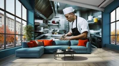 Candid photo of a young male chef preparing food in a restaurant kitchen, displaying culinary expertise and passion, ensuring delicious and high-quality dishes for patrons to enjoy, generative ai Wall mural