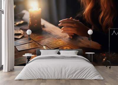 Closeup of a female fortune teller, with an array of mystical tarot cards artistically displayed on a table, alluding to future revelations, generative ai Wall mural