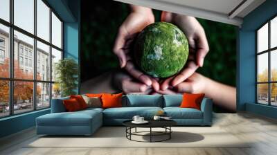 Two hands holding a small green globe, symbolizing environmental care, conservation, and the importance of working together to protect our planet for future generations, generative ai Wall mural