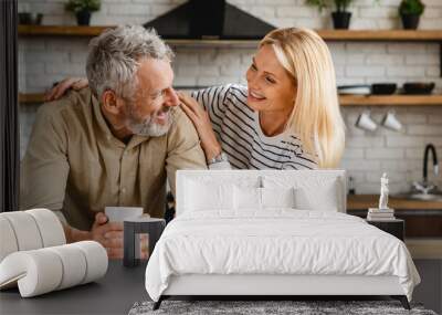 Cheerful senior couple enjoying life and fun together Wall mural