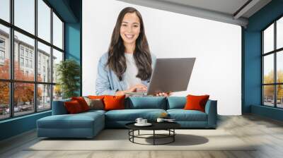 Portrait of happy young asian girl using laptop computer isolated over white background Wall mural