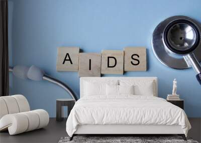 AIDS, wooden letters with stethoscope. medicine concepts Wall mural