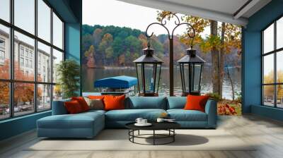 Lanterns hanging in front of fall colors around the lake Wall mural