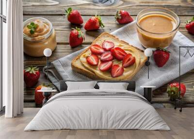 A simple yet delicious breakfast of toast spread with peanut butter and topped with sliced strawberries, accompanied by a glass of creamy peanut butter Wall mural