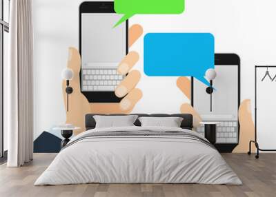 Two smartphones messaging. Two people holding mobile phones and chatting. Blue and green speech bubbles. Wall mural