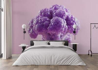 A vibrant purple cauliflower floating against a soft pink background, showcasing its unique color and texture for creative designs. Wall mural