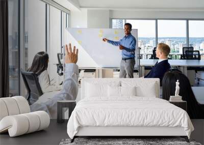 African business man presenter team leader giving presentation training on whiteboard in office. Male company executive manager presenting corporate strategy at group conference meeting. Wall mural