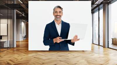 Happy mature business man using laptop standing isolated on white background. Middle aged professional businessman ceo executive wearing suit holding computer working looking at camera, portrait. Wall mural