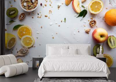 Healthy food vegan breakfast nutrition concept, fresh summer fruits nuts granola seeds on white background, organic super food on table, detox diet for health care, top close up view, copy space Wall mural