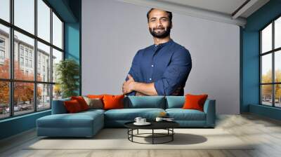 Proud confident bearded indian business man investor, rich ethnic ceo, corporate executive, professional lawyer banker, male office employee standing isolated on gray with arms crossed. Portrait Wall mural