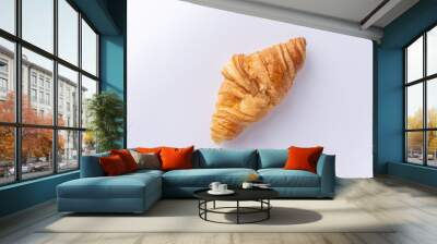 Plain croissant on white background Wall mural