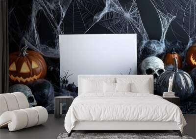 Blank mockup template of an invitation card surrounded by silver spider webs, dark pumpkins, and glowing skulls. Wall mural