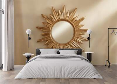 A luxurious art deco round mirror in a sunburst frame, hanging on a neutral-colored wall Wall mural