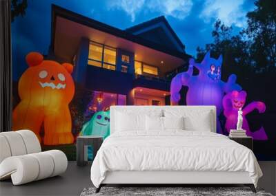 Inflatable Halloween Decorations In Front of a House at Night Wall mural