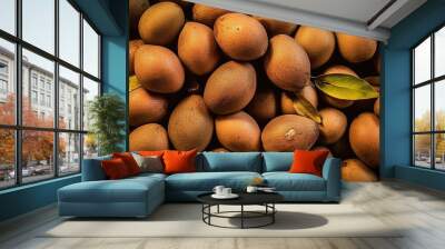 Realistic photo of a bunch of sapodillas. top view fruit scenery Wall mural