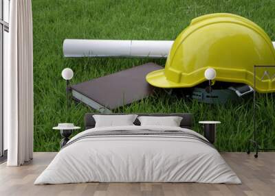 Engineer hat and books in the field. Wall mural