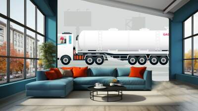 Workers are driving a petrol truck through traffic. Wall mural