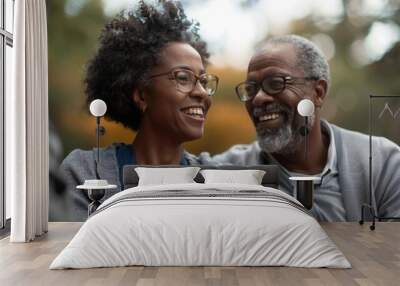 A cheerful older couple is seen in discussion with their financial advisor in a serene park setting surrounded by trees They appear to be engaged in a retirement planning meeting,with the advisor Wall mural