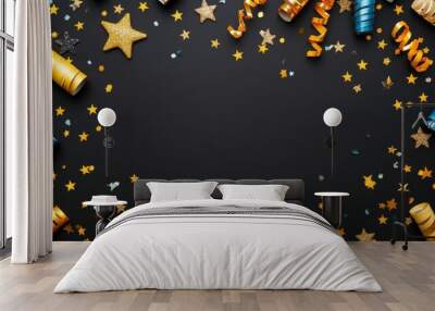 Flat lay composition of New Year s Eve party including glittering gold streamers shiny stars and colorful confetti against a deep black background  Top view of a creative Wall mural