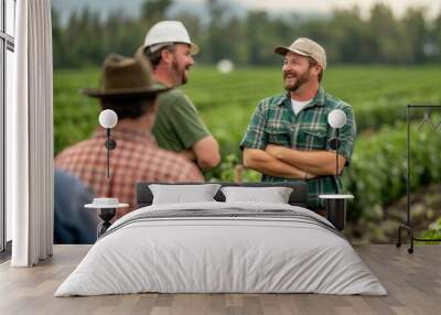 Group of farmers in a cooperative meeting gathered in a lush green field discussing strategies and techniques for managing their shared orchard  The men are wearing casual attire Wall mural