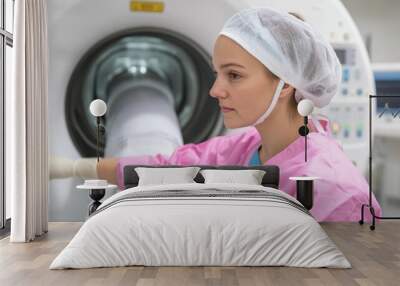 Radiographer in a hospital setting carefully preparing contrast media for a barium X ray procedure a diagnostic imaging technique used to examine the gastrointestinal tract Wall mural